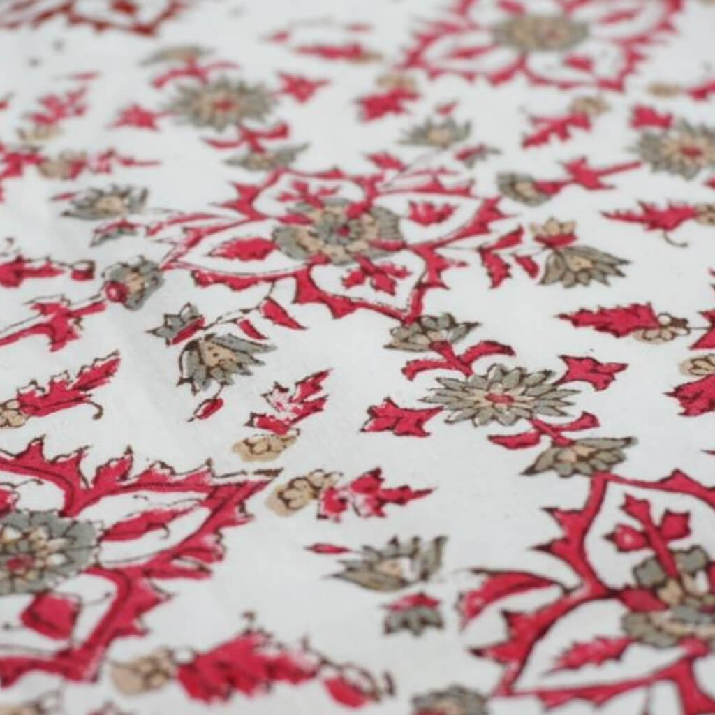 Close-up of hand block print on organic cotton running fabric | Myyra Jaipur