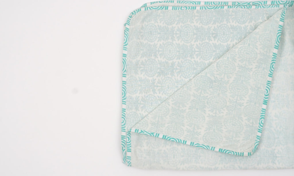 Dohar (lightweight cotton quilt) folded showing pattern repeat of hand block print | Myyra Jaipur