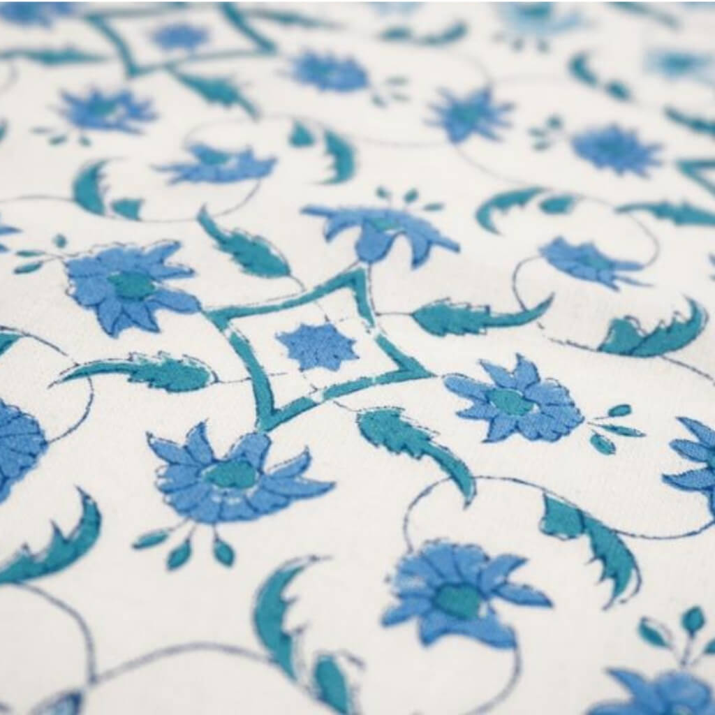 Close-up of hand block print on organic cotton running fabric | Myyra Jaipur
