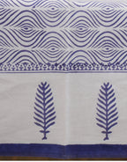 Close-up of hand block print on organic cotton table cover | Myyra Jaipur