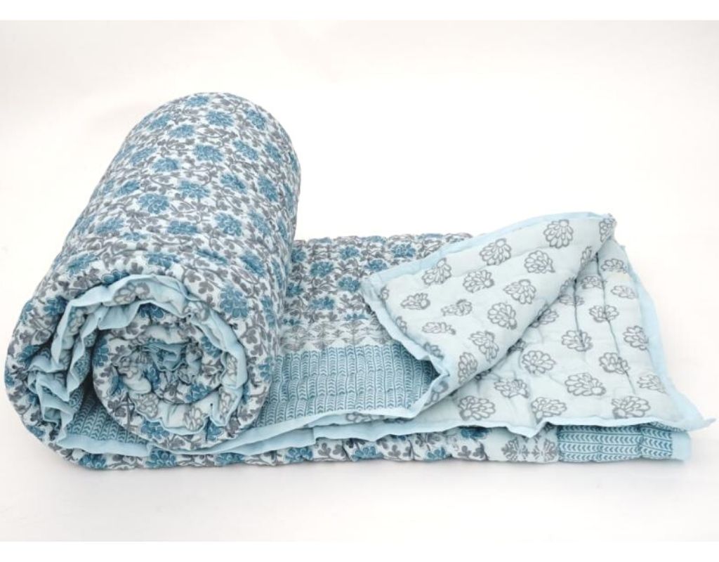 Close-up of hand block print on organic cotton quilt | Myyra Jaipur