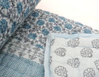 Detail of artisan block print on organic cotton quilt | Myyra Jaipur