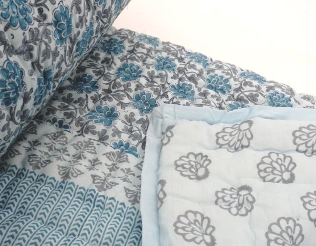 Detail of artisan block print on organic cotton quilt | Myyra Jaipur