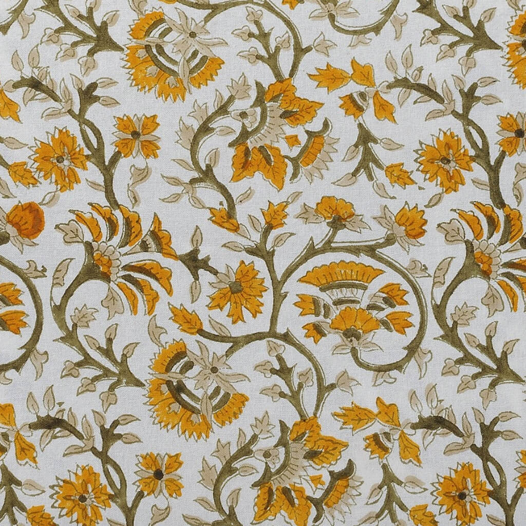 Folded hand block printed organic cotton yardage showing pattern repeat | Myyra Jaipur