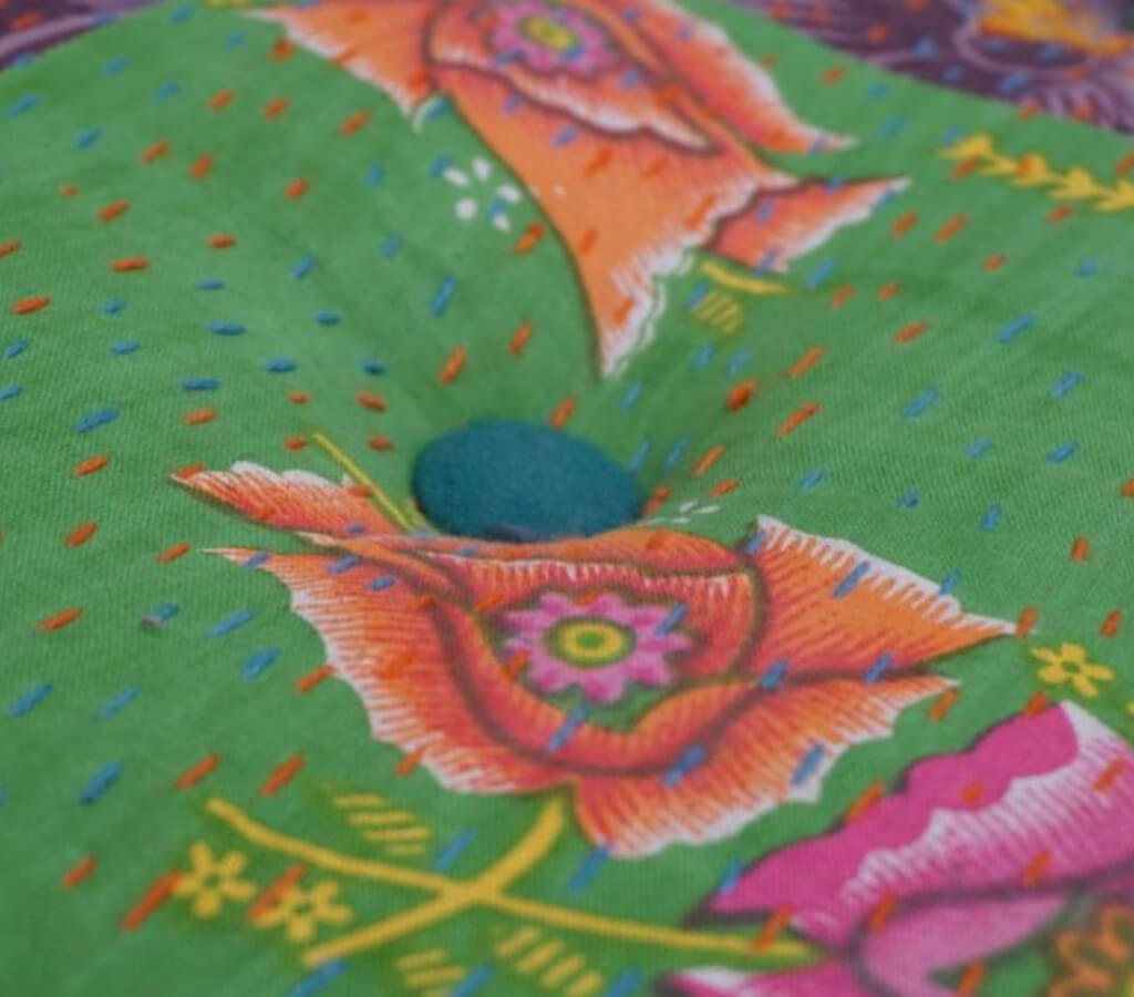 Floor cushion styled view from Myyra Jaipur