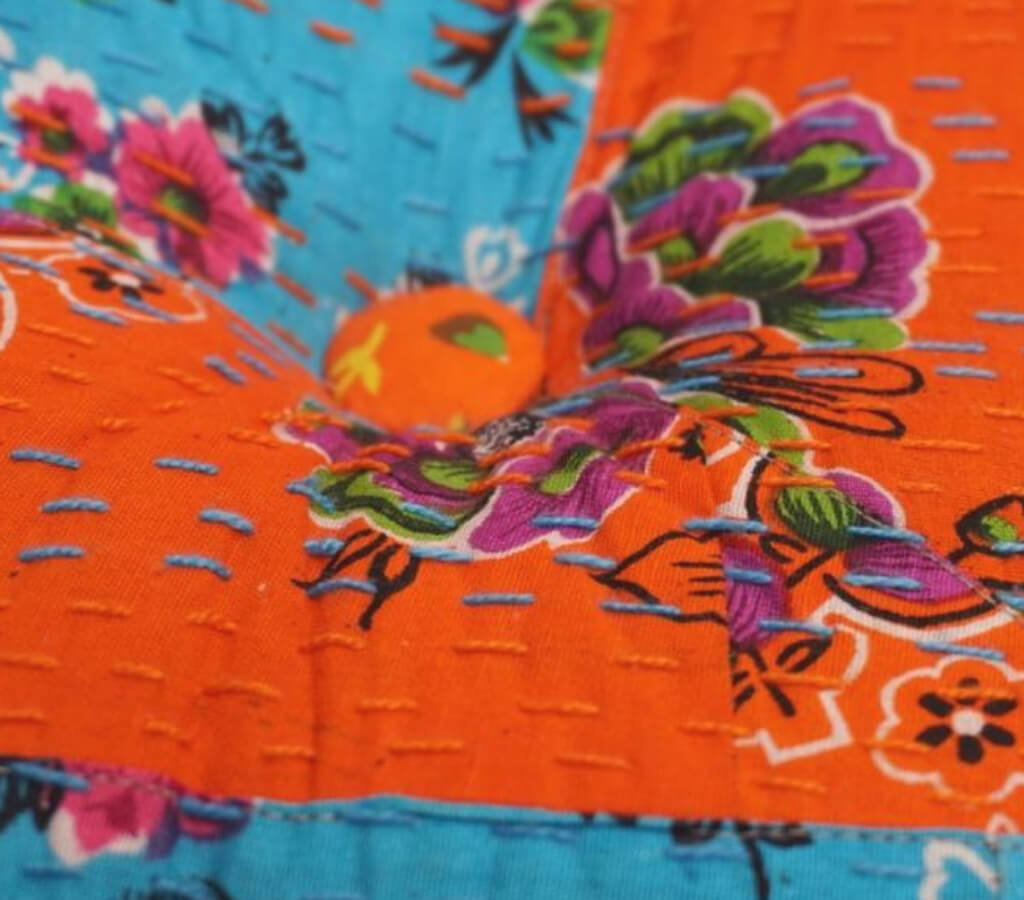 Floor cushion styled view from Myyra Jaipur