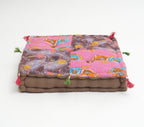 Close-up of hand block print on organic cotton floor cushion | Myyra Jaipur