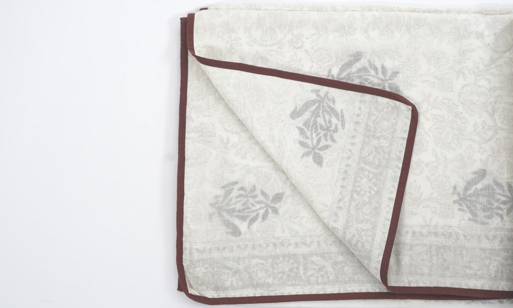 Dohar (lightweight cotton quilt) folded showing pattern repeat of hand block print | Myyra Jaipur