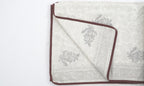 Dohar (lightweight cotton quilt) folded showing pattern repeat of hand block print | Myyra Jaipur