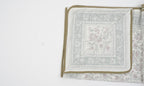 Dohar (lightweight cotton quilt) folded showing pattern repeat of hand block print | Myyra Jaipur