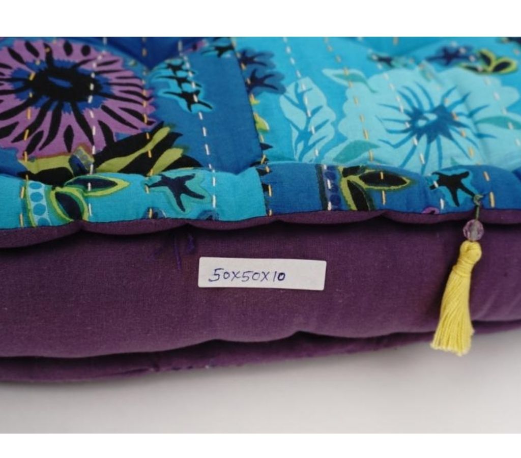 Floor cushion styled view from Myyra Jaipur
