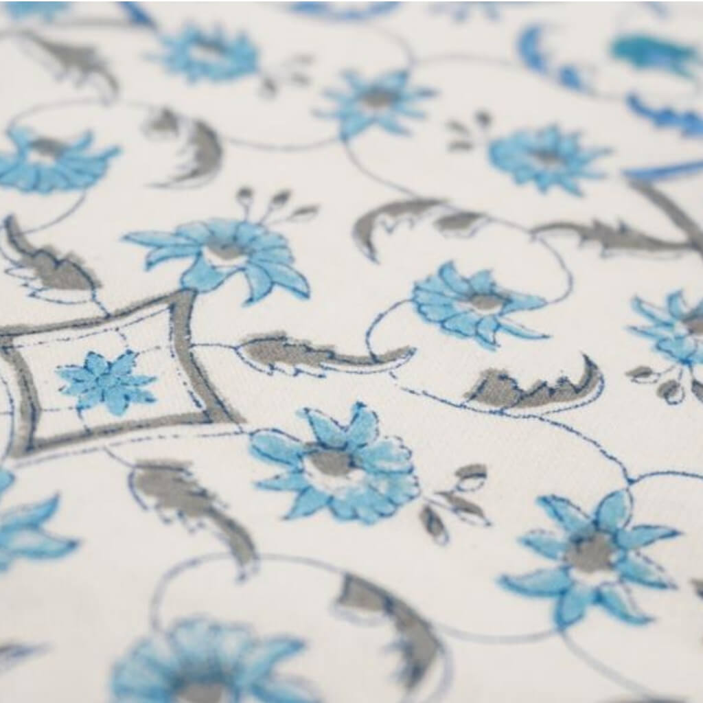 Close-up of hand block print on organic cotton running fabric | Myyra Jaipur