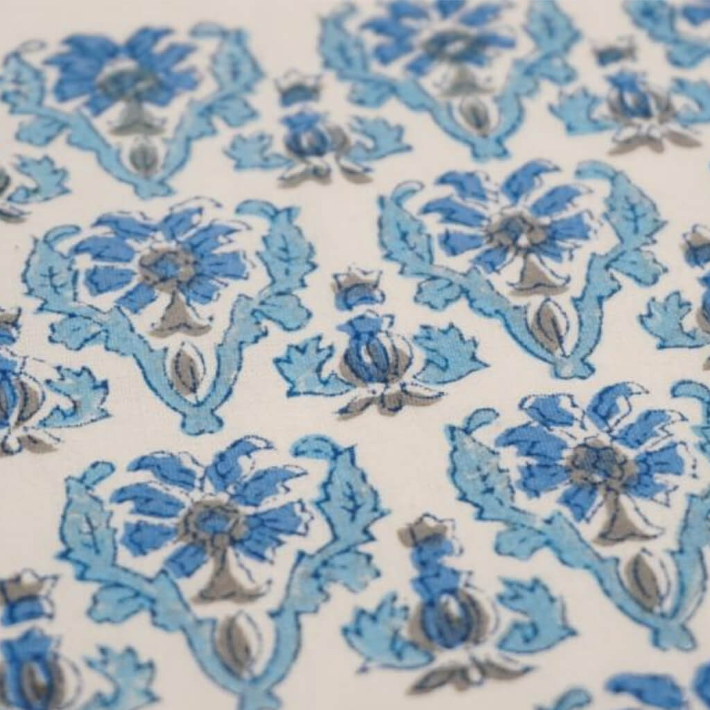 Close-up of hand block print on organic cotton running fabric | Myyra Jaipur