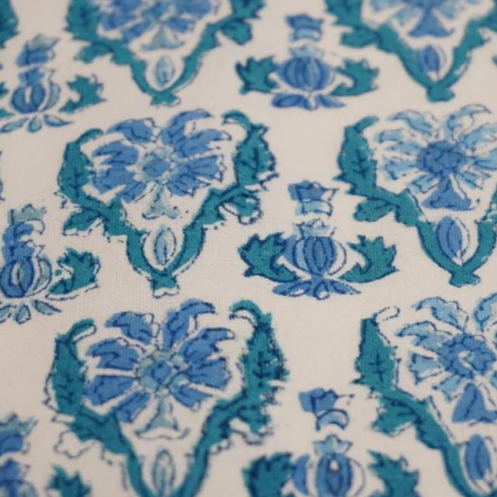 Close-up of hand block print on organic cotton running fabric | Myyra Jaipur