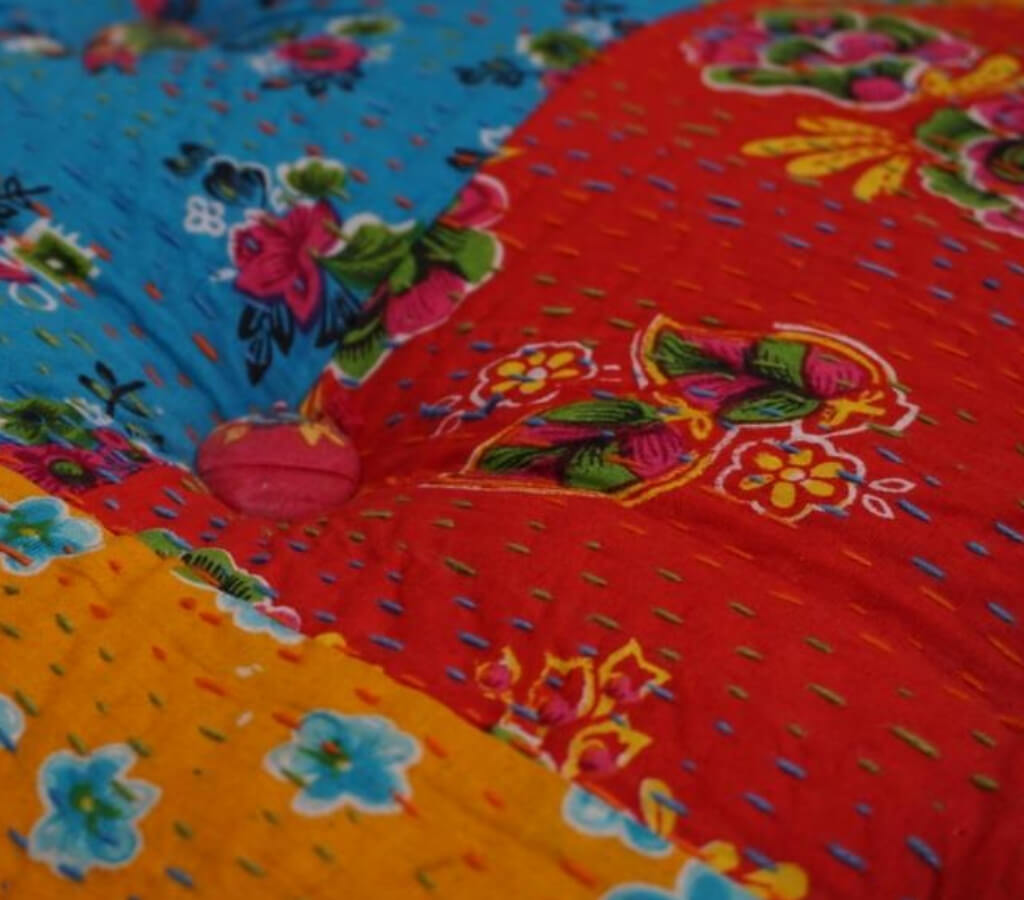 Floor cushion styled view from Myyra Jaipur