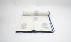 Close-up of hand block print on organic cotton dohar (lightweight cotton quilt) | Myyra Jaipur
