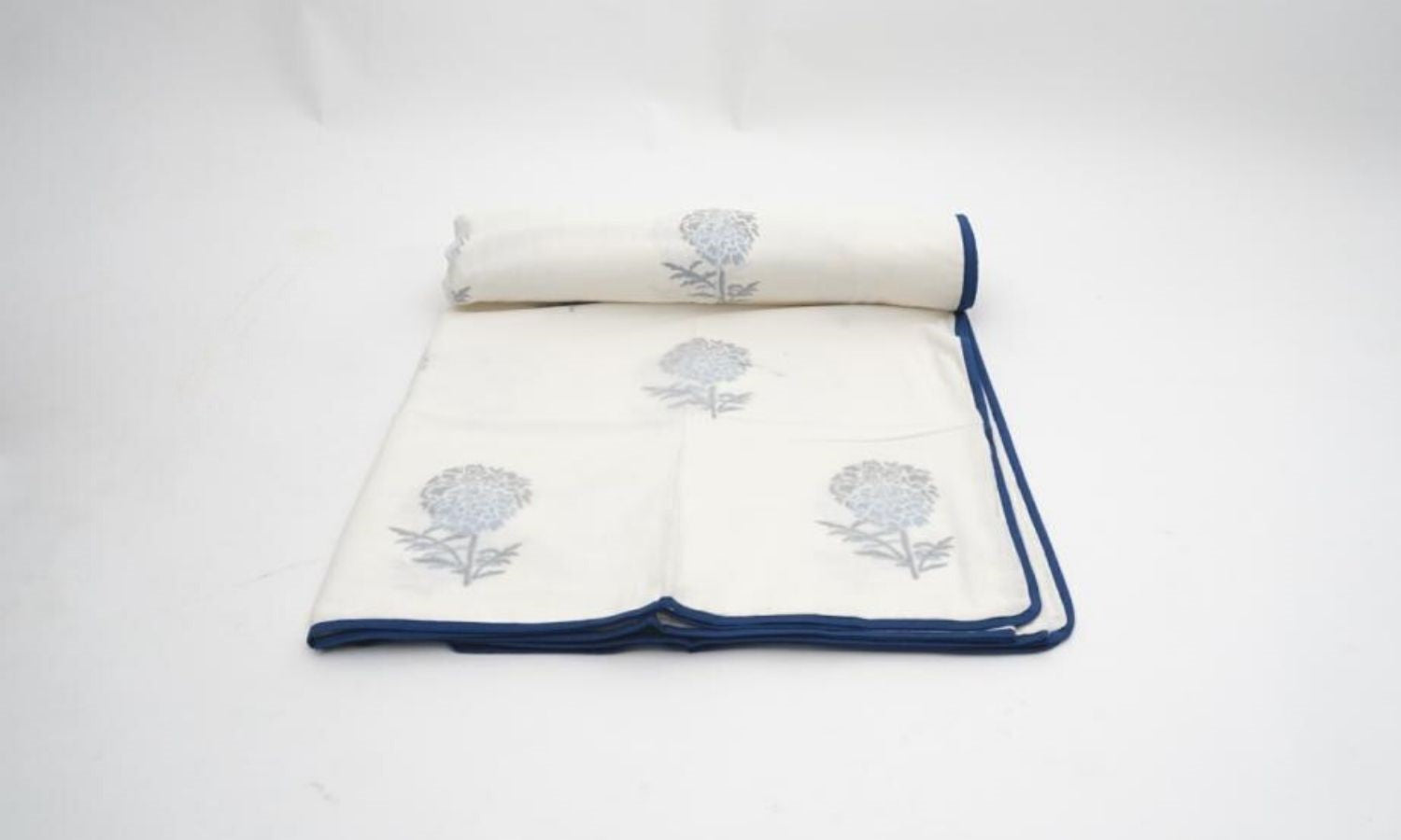 Close-up of hand block print on organic cotton dohar (lightweight cotton quilt) | Myyra Jaipur