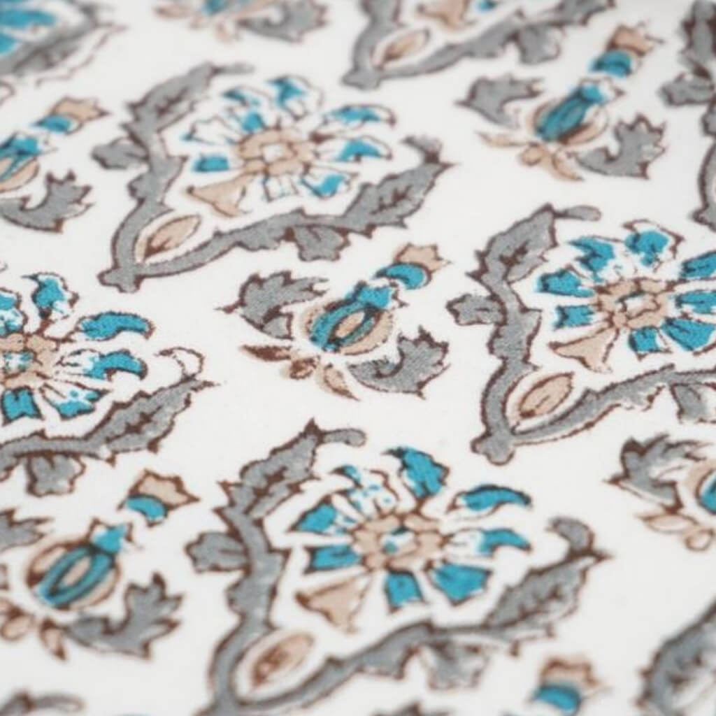 Close-up of hand block print on organic cotton running fabric | Myyra Jaipur