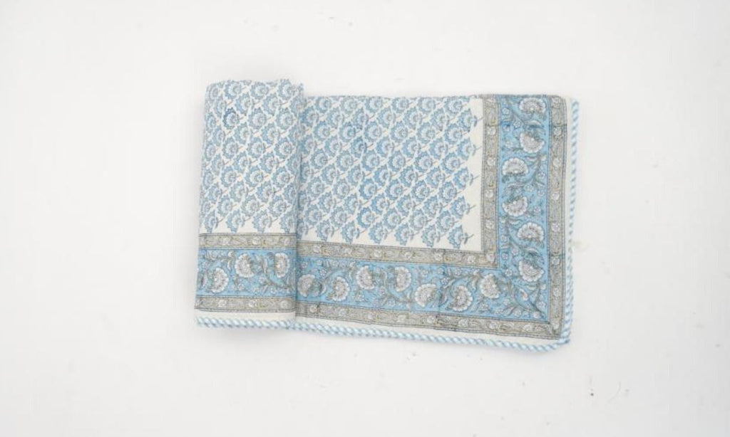 Close-up of hand block print on organic cotton dohar (lightweight cotton quilt) | Myyra Jaipur