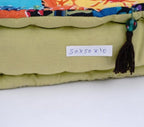Floor cushion styled view from Myyra Jaipur