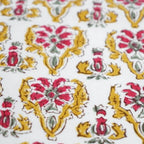 Close-up of hand block print on organic cotton running fabric | Myyra Jaipur