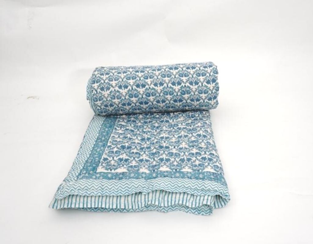 Close-up of hand block print on organic cotton quilt | Myyra Jaipur