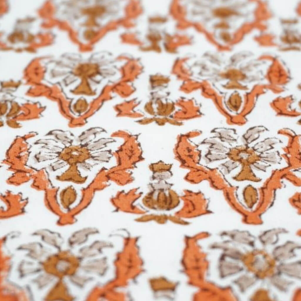 Close-up of hand block print on organic cotton running fabric | Myyra Jaipur