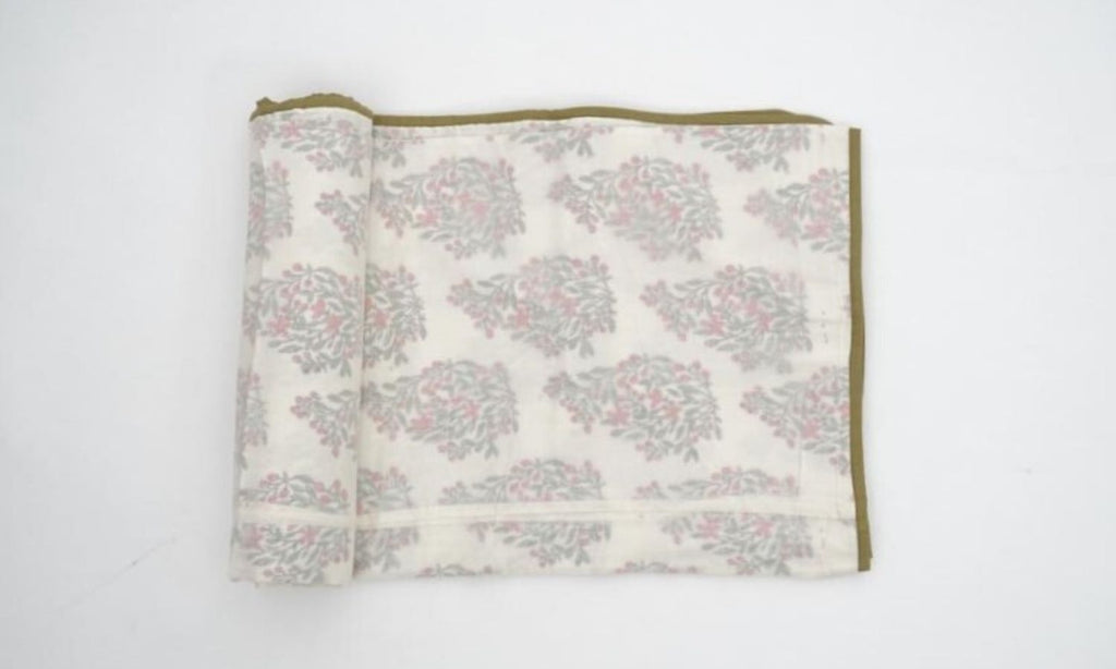 Close-up of hand block print on organic cotton dohar (lightweight cotton quilt) | Myyra Jaipur