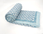 Styled view of hand block printed organic cotton quilt | Myyra Jaipur