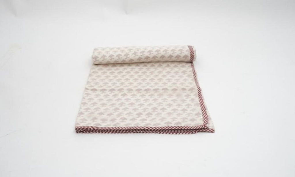 Close-up of hand block print on organic cotton dohar (lightweight cotton quilt) | Myyra Jaipur