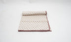 Close-up of hand block print on organic cotton dohar (lightweight cotton quilt) | Myyra Jaipur