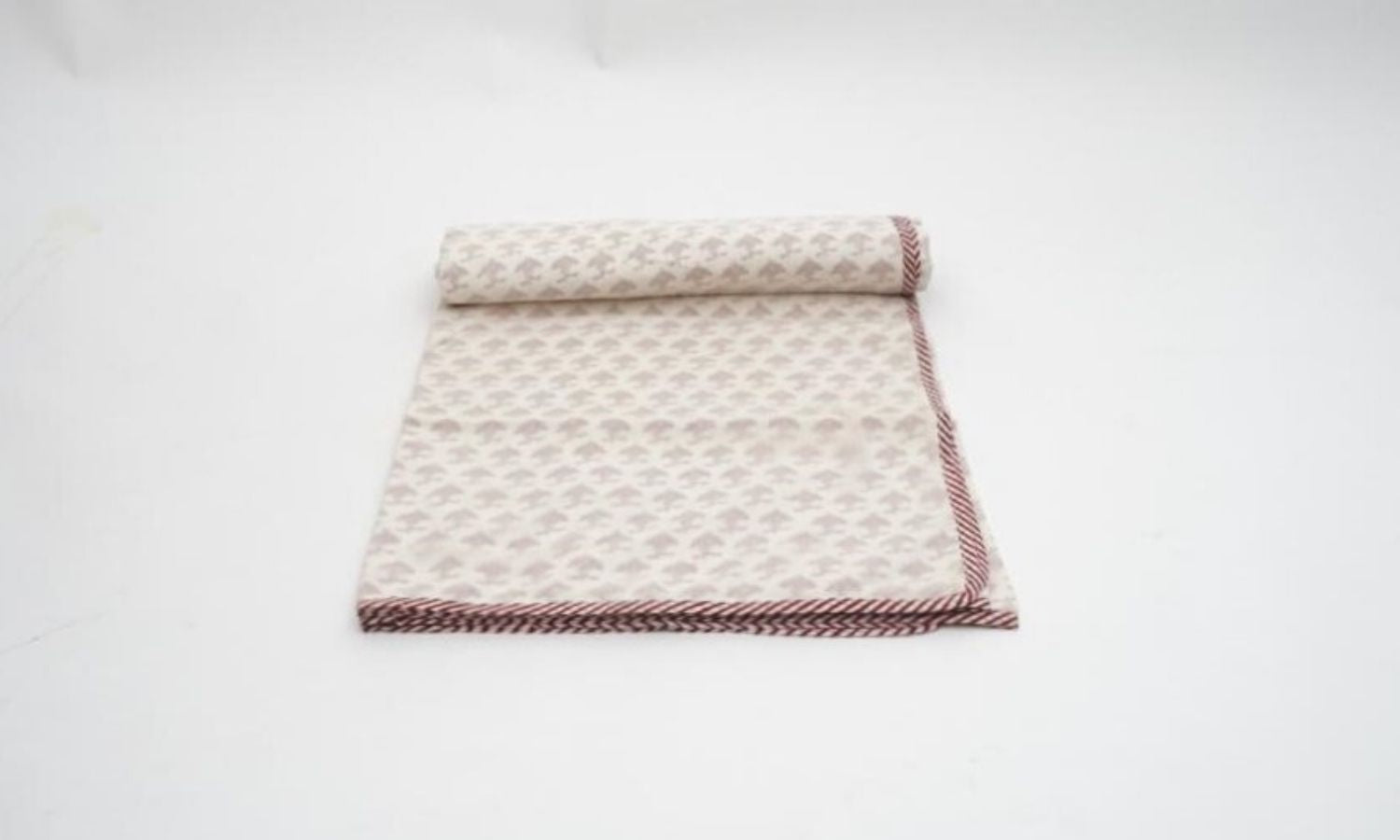 Close-up of hand block print on organic cotton dohar (lightweight cotton quilt) | Myyra Jaipur
