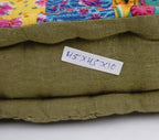 Floor cushion styled view from Myyra Jaipur