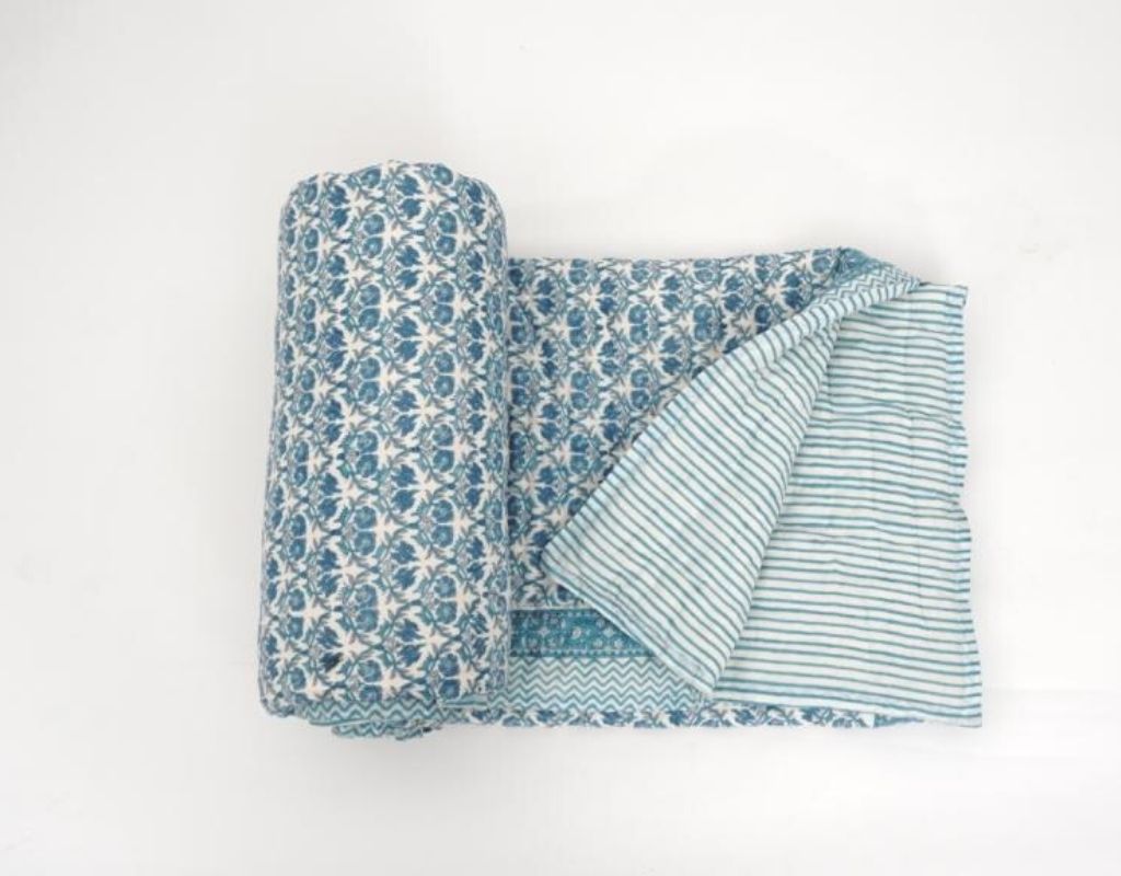 Detail of artisan block print on organic cotton quilt | Myyra Jaipur