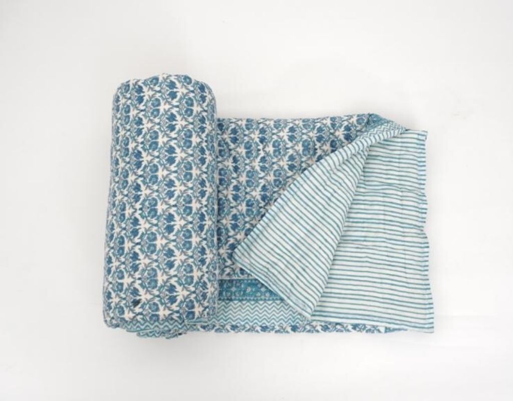 Detail of artisan block print on organic cotton quilt | Myyra Jaipur