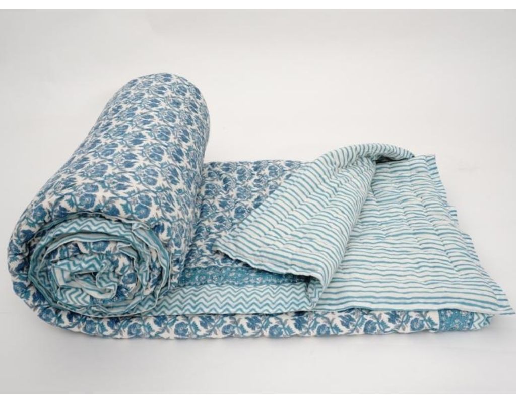 Detail of artisan block print on organic cotton quilt | Myyra Jaipur