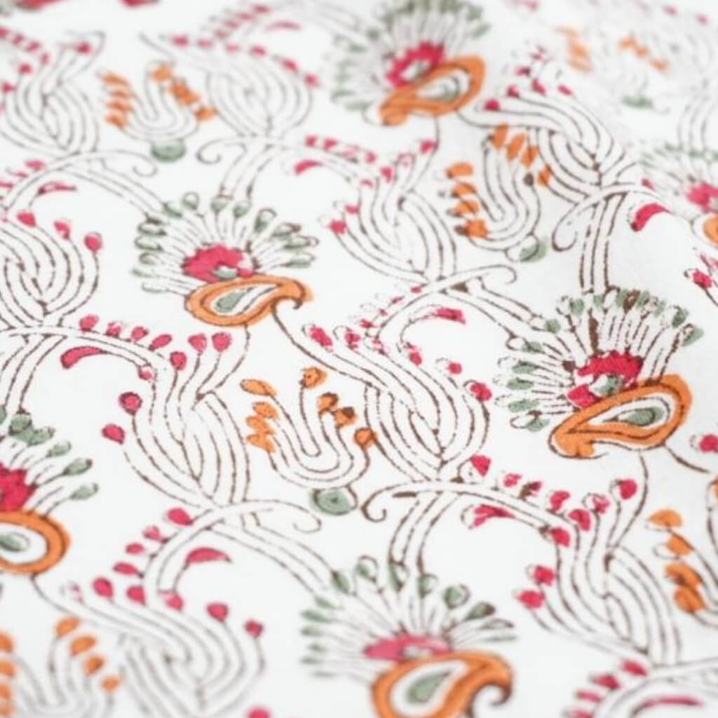 Close-up of hand block print on organic cotton running fabric | Myyra Jaipur