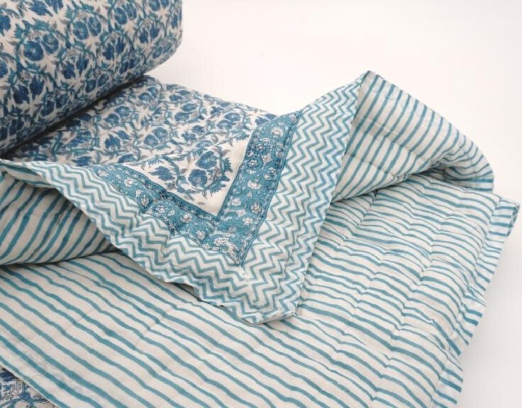 Detail of artisan block print on organic cotton quilt | Myyra Jaipur