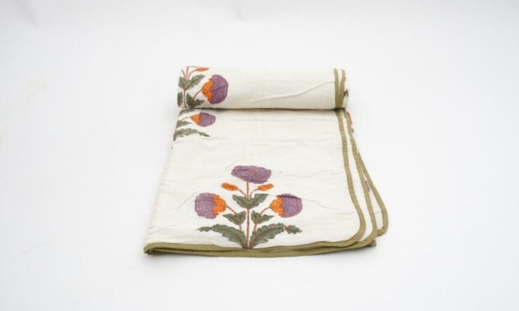 Close-up of hand block print on organic cotton dohar (lightweight cotton quilt) | Myyra Jaipur