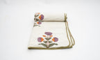 Close-up of hand block print on organic cotton dohar (lightweight cotton quilt) | Myyra Jaipur
