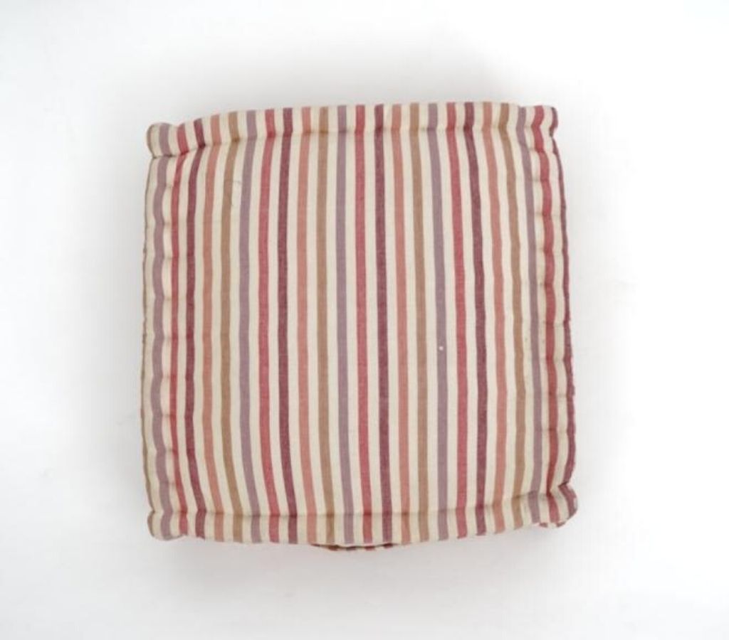 Floor cushion styled view from Myyra Jaipur