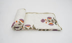 Dohar (lightweight cotton quilt) folded showing pattern repeat of hand block print | Myyra Jaipur