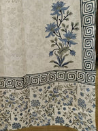 Folded organic cotton curtain showing block printed repeat | Myyra Jaipur