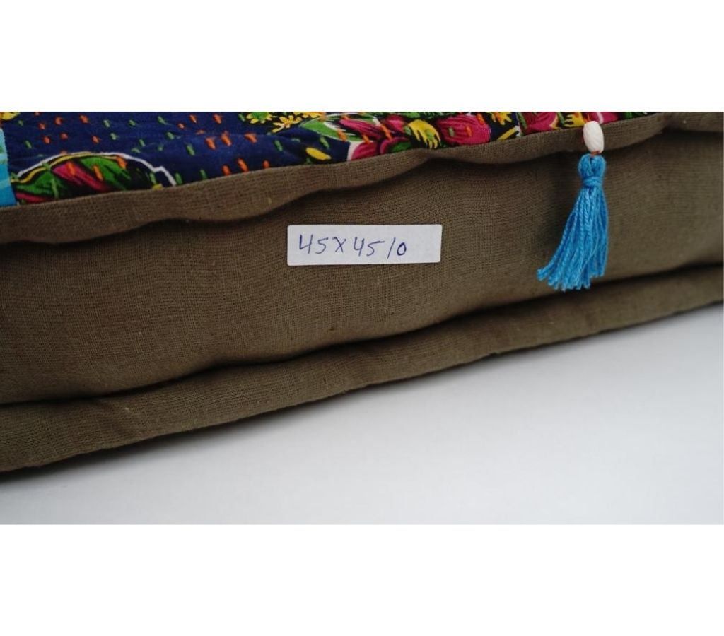 Floor cushion styled view from Myyra Jaipur