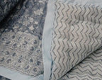 Detail of artisan block print on organic cotton quilt | Myyra Jaipur