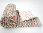 Styled view of hand block printed organic cotton quilt | Myyra Jaipur
