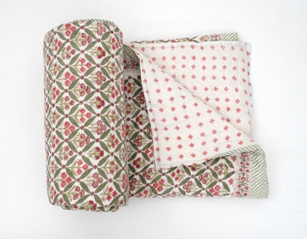 Detail of artisan block print on organic cotton quilt | Myyra Jaipur