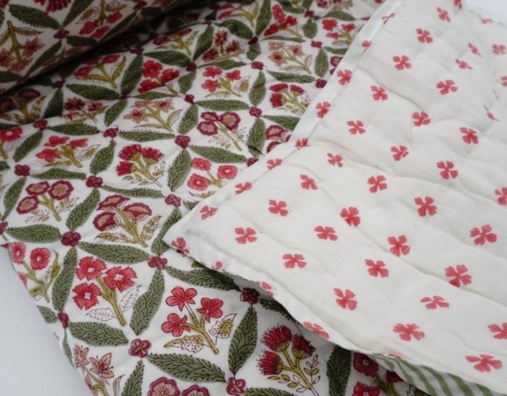 Detail of artisan block print on organic cotton quilt | Myyra Jaipur