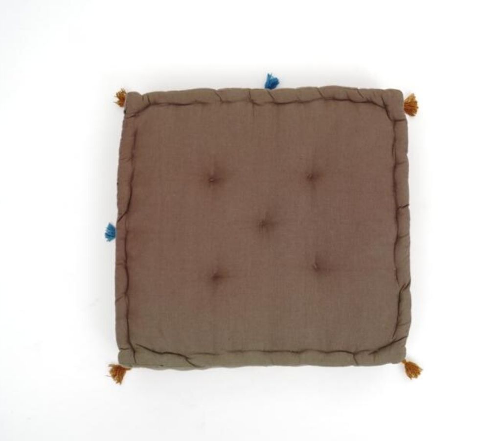 Floor cushion styled view from Myyra Jaipur