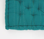 Floor cushion styled view from Myyra Jaipur